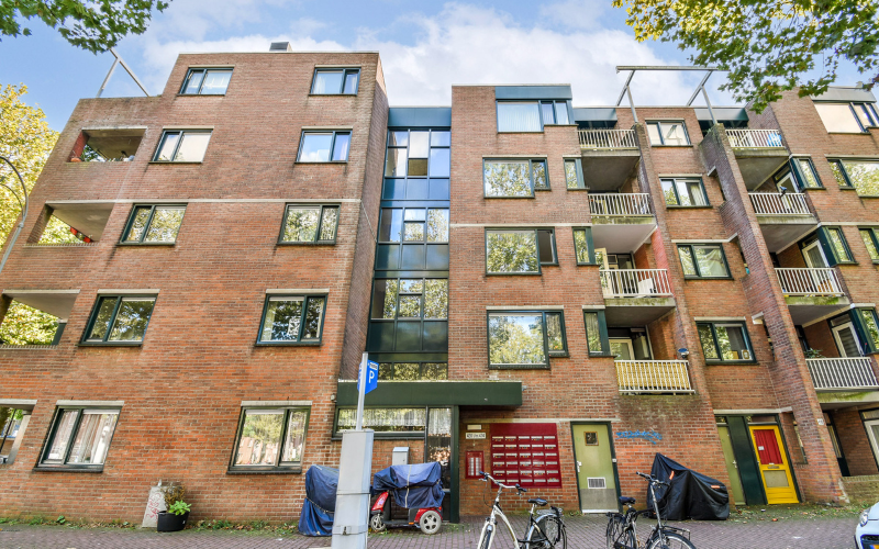 Exterior of a small multifamily apartment building with multiple units and entryways — ideal for PCA-style inspections and rental property evaluations.